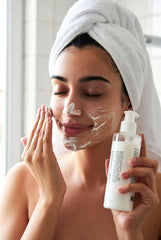 Pakistani woman using Wiki Special Whitening Creamy Facial Wash for daily skincare routine. Gentle face cleansing with anti-acne formula.